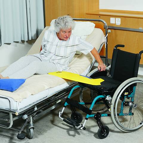 Seated patient transfer – Glideboard in use